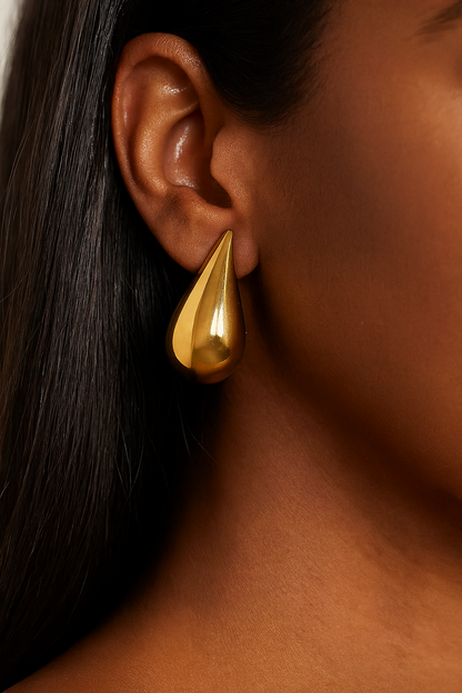 Golden elongated hoop earring
