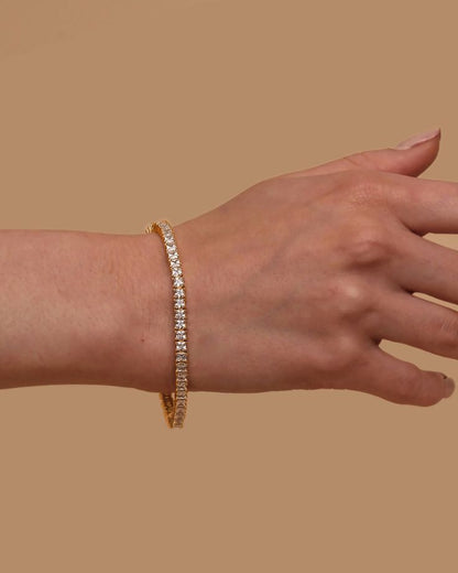 Gold tennis bracelet