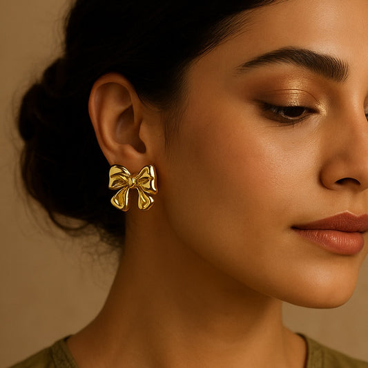 Gold bow earrings