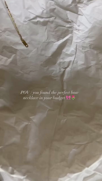 Gold bow chain